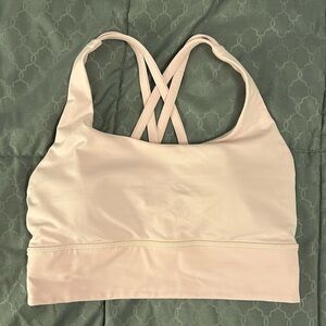 Light pink lululemon energy bra size 6. Worn twice